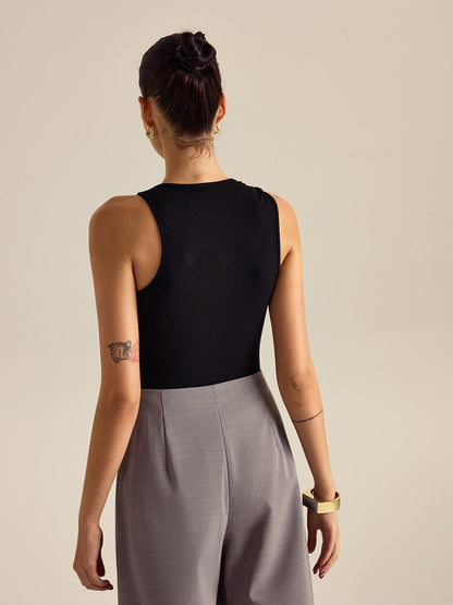 Glinsterende Mouwloze Top Voor Modebewuste Dames – Luxe Metaalstof, Elegante Pasvorm & Verfijnde Look Voor Elke Speciale Gelegenheid.